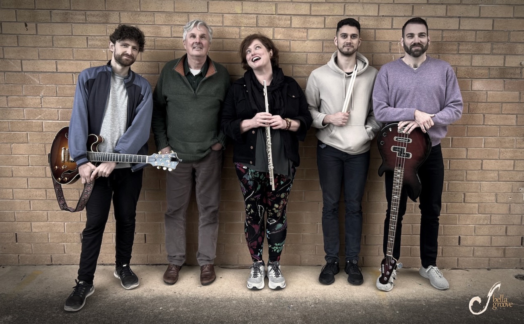 The full Bella Groove line-up standing together for a group portrait