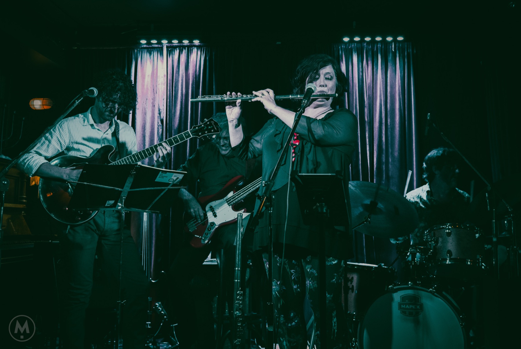 The Bella Groove quartet mid-performance on stage